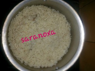 الأرز بالدجاج و الحمص على الطريقة الخليجية بالصور 9