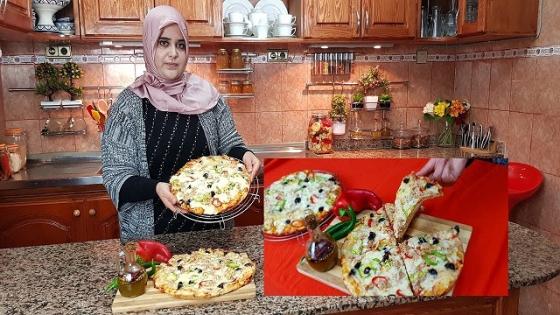 بيتزا المطاعم بعجين إيطالي أصلي بدون دلك من أسهل مايكون وبدون اي إضافات
